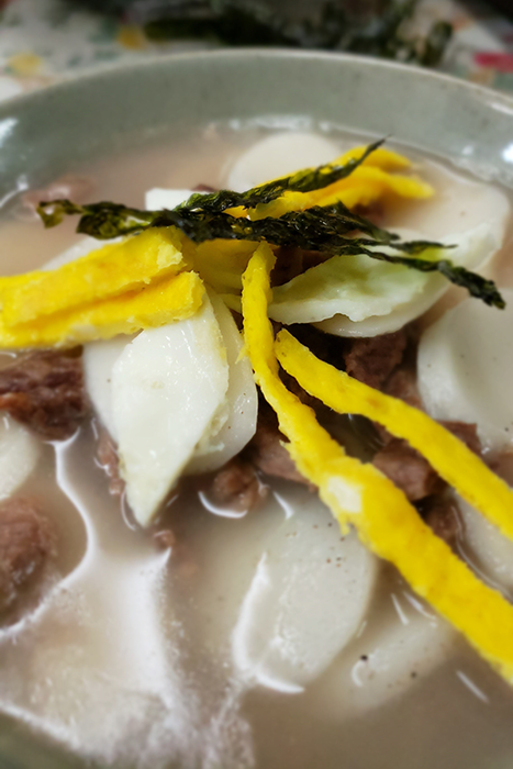 tteokguk Korean soup with beef and sliced rice cakes