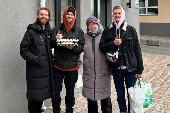 Ukrainian Jewish community leader Andy and fellow Jewish activists bring food to an individual in need