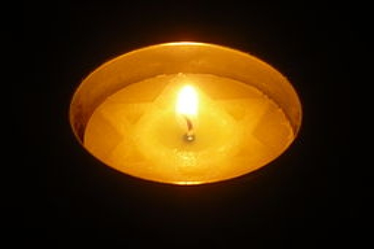A candle to commemorate the victims of the Holocaust for Yom Hashoah