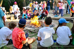 Campers enjoying music by the fire at URJ Greene Family Camp